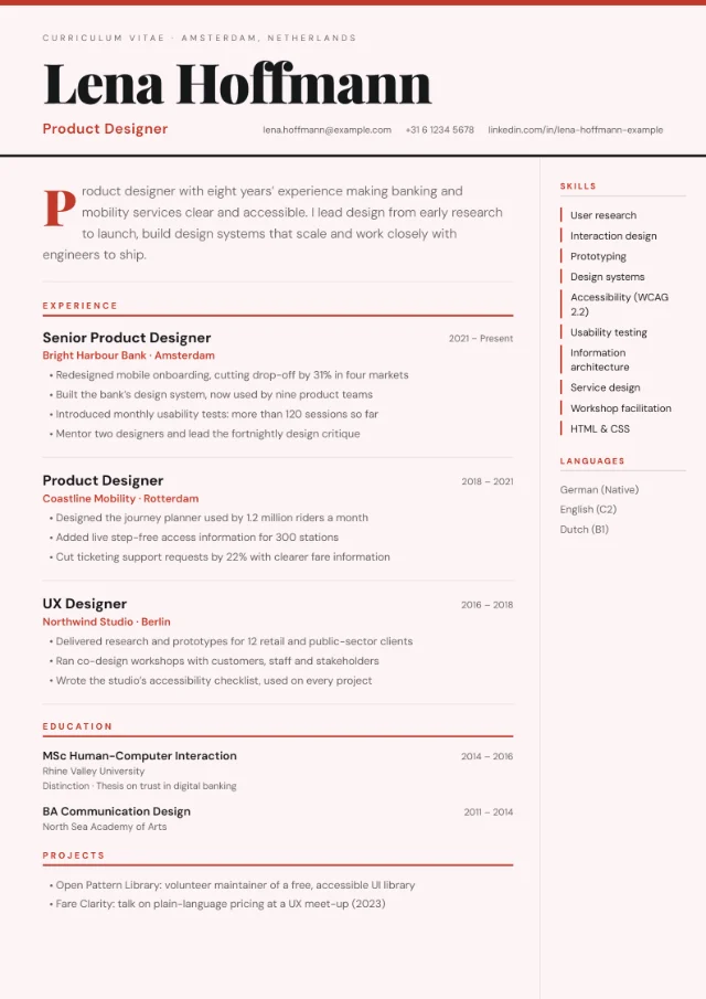 Preview of the Magazine CV template in the Blush colour scheme, filled with a fictional sample CV: a pale pink editorial page with a huge black serif name under a red top rule, a pull-quote profile with a large red first letter, ruled lines between roles and a narrow side column for skills and languages.